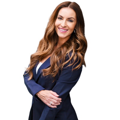 Woman smiling at camera with one arm holding her other arm